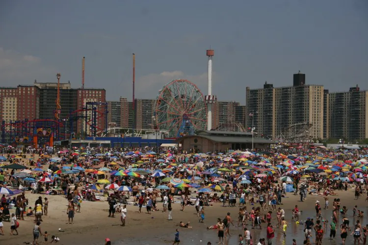 A man on stilts walked through the crowd, showing his patriotic spirit at the annual Nathan’s Hot Dog-Eating Contest on Coney Island on July Fourth. (Kristen Meriwether/The Epoch Times)