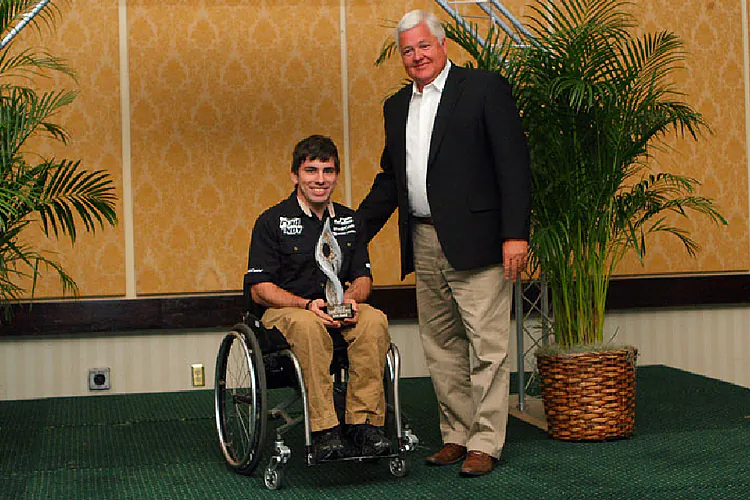 Johnson receives the Spirit Award from USF 2000 series Owner and CEO Dan Andersen. (Michael Johnson Racing)
