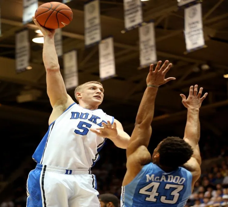 Mason Plumlee (L) has 16 double-doubles thus far and put up 18 points and 11 rebounds in Duke’s win over North Carolina earlier in the season. (Streeter Lecka/Getty Images)