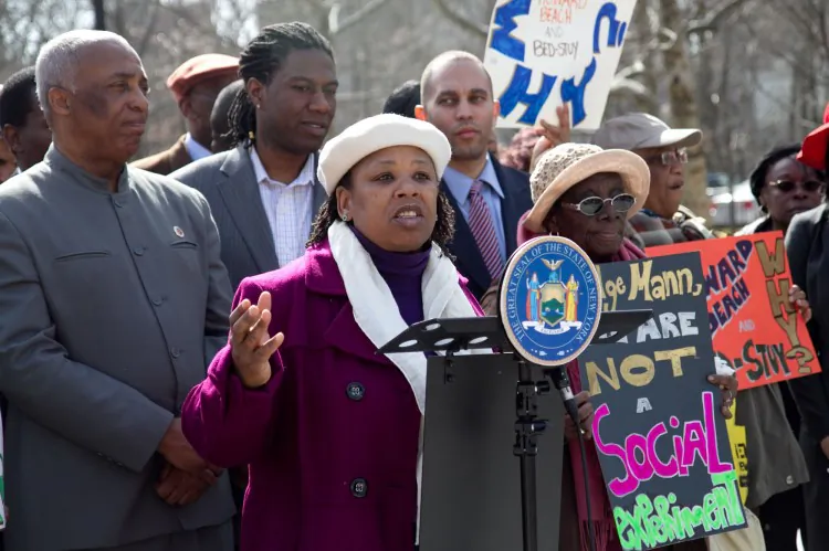 Civil rights attorney and founder of the Center for Law and Social Justice in Brooklyn Esmeralda Simmons (C) talks about the disadvantages to Brooklyn’s African-American community if Magistrate Judge Roanne Mann’s redistricting plan goes into effect. Behind her stands, Assemblyman Hakeem Jeffries (R), Councilman Jumaane Williams (C), and Councilman Charles Barron (L). (Tara MacIsaac/The Epoch Times)