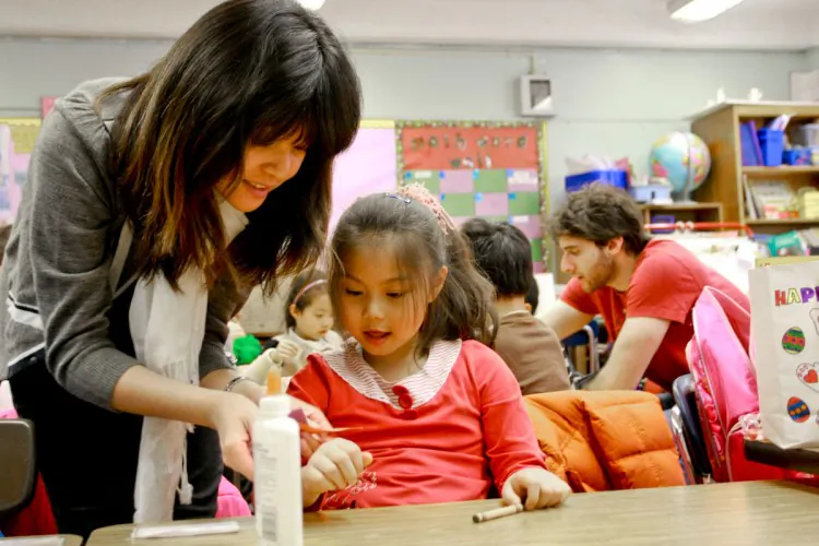A student makes crafts at Open Sight, an afterschool program at P.S. 2 in Chinatown, which teaches Chinese children about the many different cultures in New York City outside of Chinatown. (Tara MacIsaac/The Epoch Times)