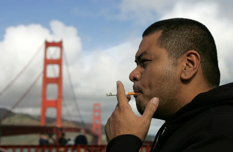 A man smokes a cigarette near the Golden Gate Bridge in San Francisco (file photo). (Justin Sullivan/Getty Images)