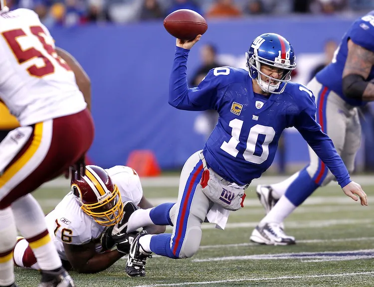 Eli Manning (10) missed on his first six passes and finished with his worst statistical performance of the season. (Jeff Zelevansky/Getty Images)