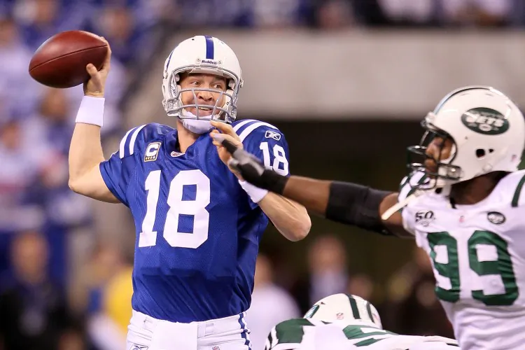 Peyton Manning (L) will most likely continue to elude the Jets. (Andy Lyons/Getty Images)