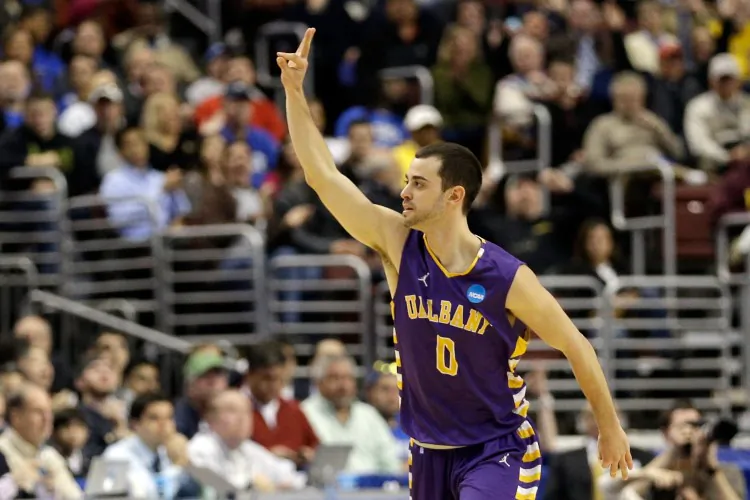 Blake Metcalf #21 of the Albany Great Danes walks off the court after losing to the Duke Blue Devils 73-61. (Rob Carr/Getty Images)