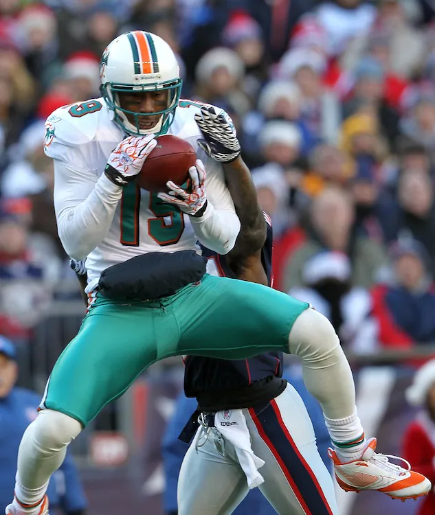 Brandon Marshall (with ball) holds the NFL record for most catches in a game with 21. (Jim Rogash/Getty Images)