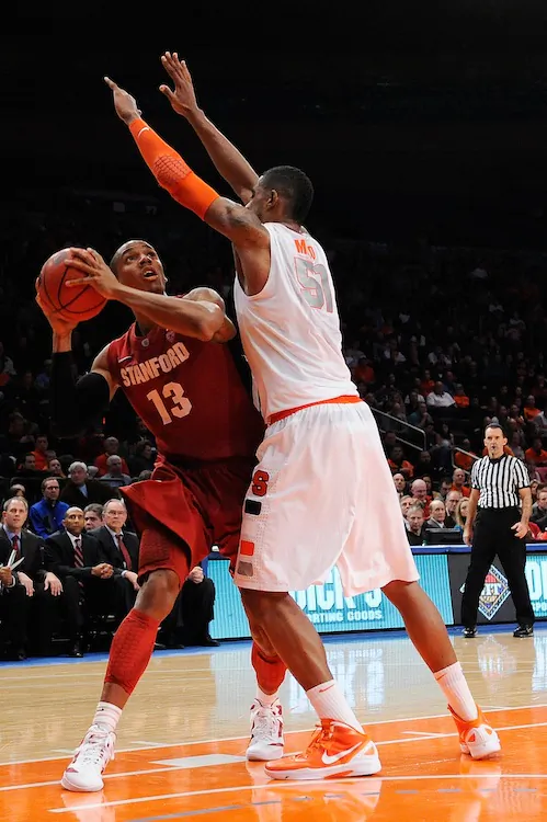Fab Melo's (R) 3.0 blocks per game is 13th most in the NCAA. (Patrick McDermott/Getty Images)