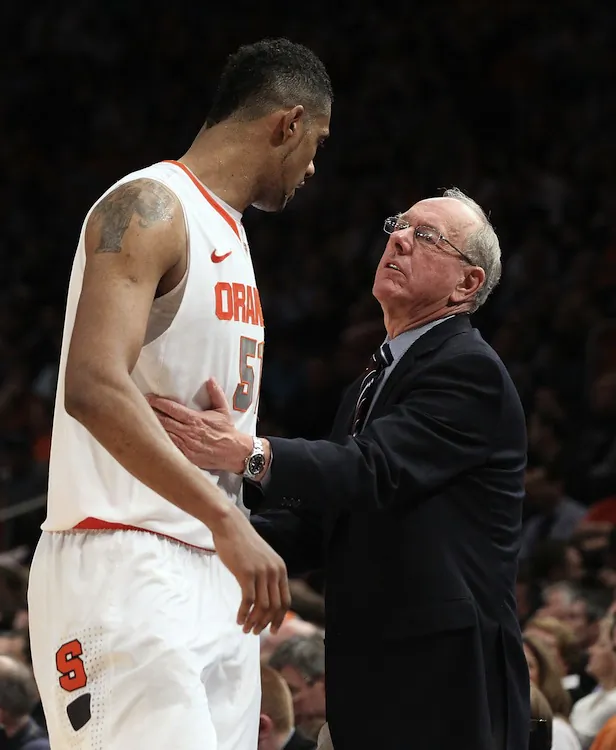 Fab Melo (L) led the Orange to victory in 29 of the 30 games played for head coach Jim Boeheim (R). (Jim McIsaac/Getty Images)