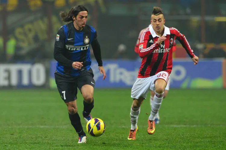 Inter’s Ezequiel Schelotto (L) challenges for the ball with AC Milan’s Stephan El Shaarawy in the Milan derby played on Feb. 24. (Giuseppe Cacace/AFP/Getty Images)