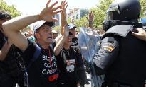 Spain Seeks Tough Austerity Cuts Amid Protests