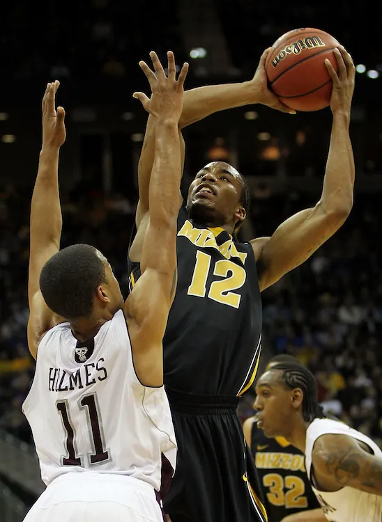 Both Missouri (black uniforms) and Texas A&M (white uniforms) are leaving the Big 12 for the SEC next season. (Jamie Squire/Getty Images)