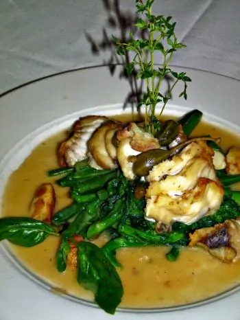 CODA DI ROSPO: Monkfish and caper berries in a white wine and lemon sauce (Nadia Ghattas/Epoch Times)
