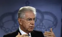 Italian Premier Insists He’ll Stay in Office