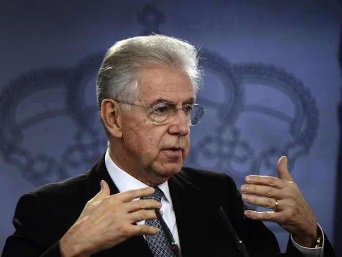 Italian Prime Minister Mario Monti gives a press conference with his Spanish counterpart Mariano Rajoy after a Spain-Italy summit at the Moncloa Palace in Madrid on Oct. 29. (Javier Soriano/AFP/Getty Images)