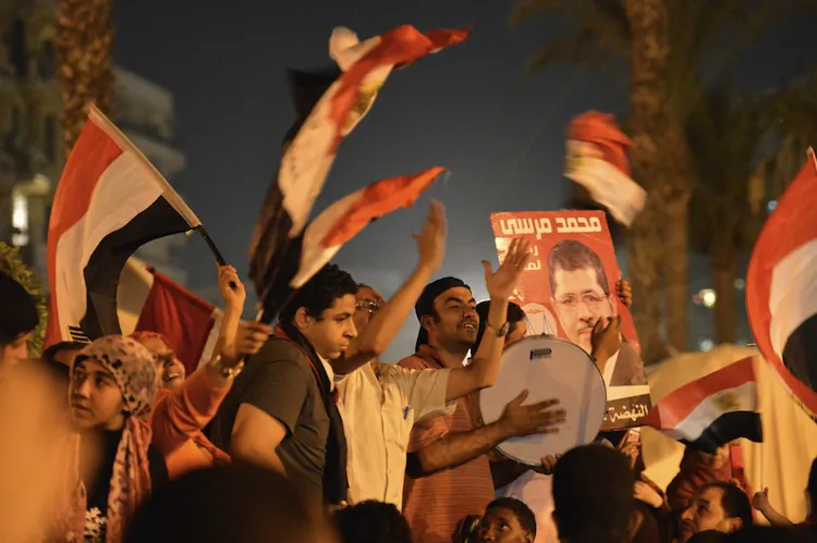 Egyptians celebrate Muslim Brotherhood candidate Mohamed Morsi's victory in Egypt's presidential elections in Cairo’s Tahrir Square on June 24. (Khaled Desouki/AFP/GettyImages)
