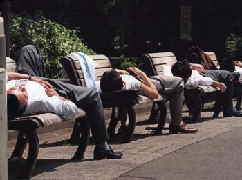 NAPPING: These Japanese businessmen are napping after the noontime meal, which helps enhance brain function, energy, mood, and productivity. Napping also helps regulate the sleep-wake cycles. (Oshikazu Tsuno/AFP/Getty Images)
