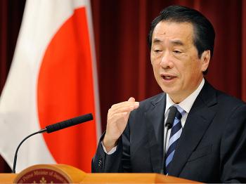 Japanese Prime Minister Naoto Kan answers questions during a press conference in Tokyo. (Toru Yamanaka/AFP/Getty Images)