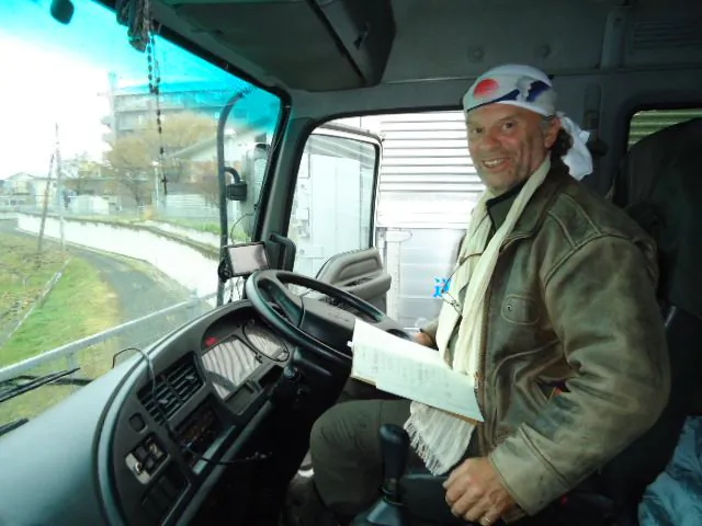 Japan expert John Craig in the four-ton truck he drove from Tokyo to Onagawa carrying relief supplies following the earthquake and tsunami last March. (Courtesy of John Craig)