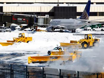 Snow removal equipment operates at Newark Liberty International Airport Terminal B following a major blizzard on December 27, 2010 in Newark, New Jersey. (Jeff Zelevansky/Getty Images)