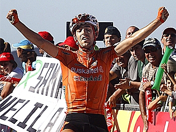 Mikel Nieve of Euskaltel-Euskadi team crosses the finish line of Stage Six of the Vuelta a España, his first Grand Tour victory. (Jaime Reina/AFP/Getty Images)