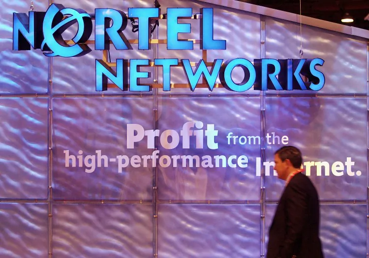The Nortel Networks booth at the Georgia World Congress Center in Atlanta, Georgia, on June 5, 2001. An Ontario Superior Court justice has dismissed fraud charges against three former top executives at the bankrupt company after a yearlong trial involving one of the largest casualties of the 1990s dot-com bubble. (Erik S. Lesser/Getty Images)
