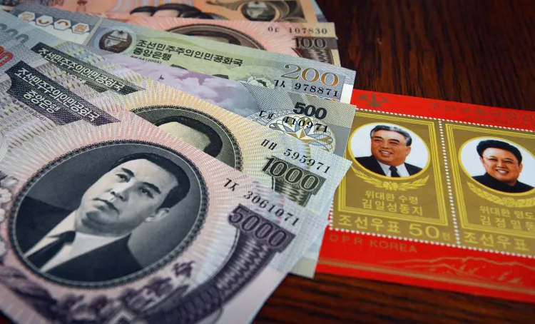 This photo illustration shows North Korean currency. The success of the recent UN sanctions may depend largely on China’s cooperation. (Mark Ralston/AFP/Getty Images)