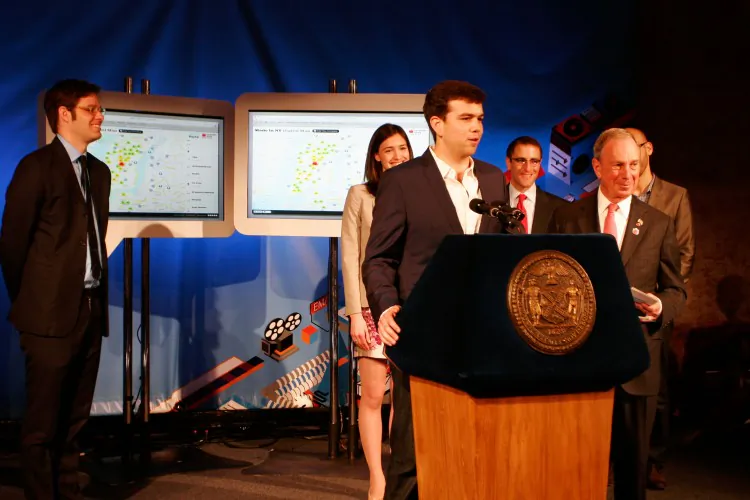 Branch CEO Josh Miller (3rd from L) at the release of a map showing tech companies and available tech positions in the city, with Mayor Michael Bloomberg, Chief Digital Officer Rachel Sterne (2nd from L), Seth Pinksky (2nd from R), and Internet Week New York Chairman David-Michel Davies (L). (Zachary Stieber/The Epoch Times)