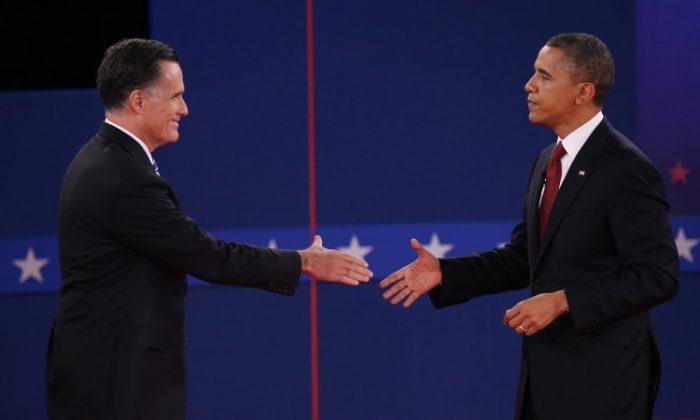 Republican presidential candidate Mitt Romney (L) and President Barack Obama shake hands Oct. 16 after last week's debate at Hofstra University in Hempstead, New York. Monday night's debate in Florida will be the third and final presidential debate. (John Moore/Getty Images)