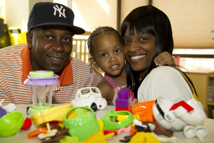Olivia: Olivia, center, was transferred from Staten Island to Steven and Alexandra Cohen Children’s Medical Center (CCMC) in Hyde Park New York after suffering a stroke when she was only one and a half years old. Following a 10 day hospital stay, she underwent months of physical and occupational therapy. CCMC is using crowdfunding catalog to raise money for the toys Olivia used during her therapy. (Lee Weissman & Adam Cooper, RBP North Shore-LIJ Studios)