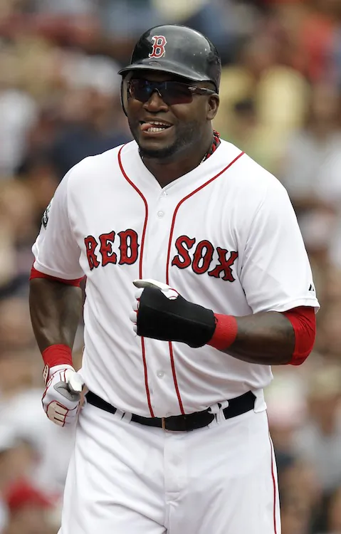 David Ortiz leads the Red Sox with a .316 batting average, 23 home runs, and 58 RBIs. (Winslow Townson/Getty Images)