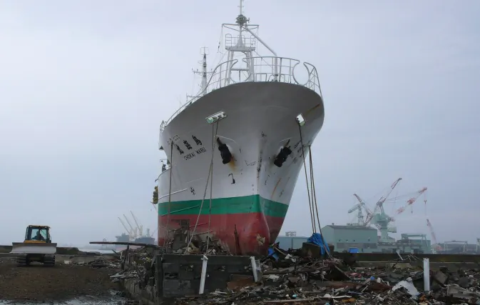 The March 11 tsunami in Japan deposited a 452-ton tuna boat in a coastal neighborhood in Higashimatsushima, Miyagi Prefecture. Even eight months later, the ship has not yet been removed. (Cindy Drukier/The Epoch Times)