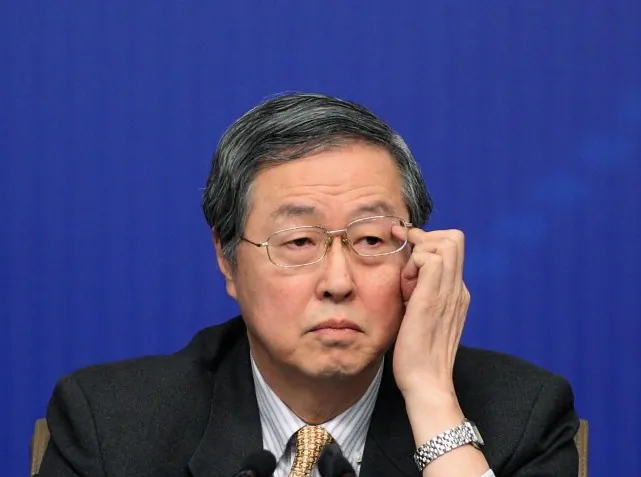 Zhou Xiaochuan, governor of the People’s Bank of China, attends a press conference of the Fifth Session of the 11th National People’s Congress focusing on monetary policy and financial issues on March 12 in Beijing. The majority of the People’s Bank of China’s stock is considered non-tradable stock and still owned by various official institutions, raising questions about their degree of separation from communist authorities. (Feng Li/Getty Images)