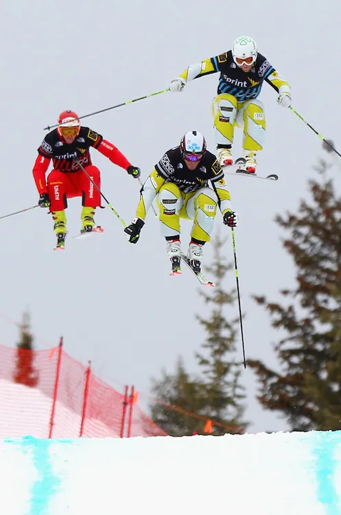 Canada’s Chris Del Bosco (C) flies to the finish line ahead of fellow countryman Brady Leman (R) and Switzerland’s Amin Niederer (L) win the Men’s Sprint U.S. Grand Prix Ski Cross Finals Saturday at The Canyons Ski Resort in Park City, Utah. (Doug Pensinger/Getty Images)