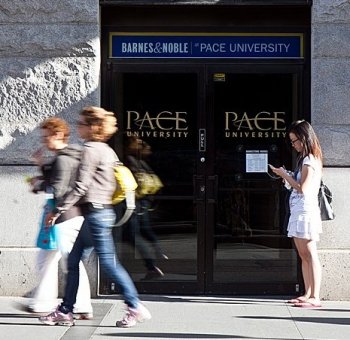 People walk past the Pace University in Manhattan. The associate-director at the Confucius Institute at Pace University said the Chinese regime has a 'right to ban' Falun Gong practitioners from volunteering at the Institute. (AMAL CHEN/THE EPOCH TIMES)