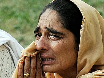 Suicide Bombers in Pakistan Kill 70, Wound 100