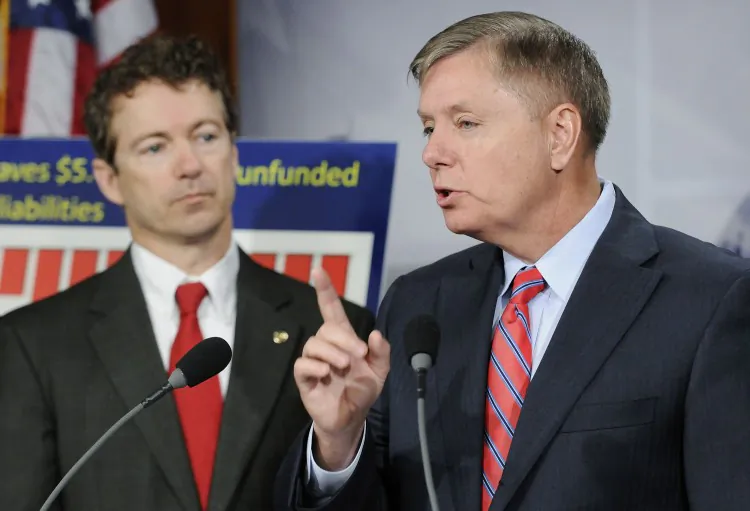 Sen. Rand Paul (R-Ky.) (L) and Sen. Lindsey Graham (R-S.C.) at the U.S. Capitol in this file photo. Graham and other senators voted down on Saturday Paul’s proposal to cut off funding for Pakistan, Libya, and Egypt. (Jonathan Ernst/Getty Images)