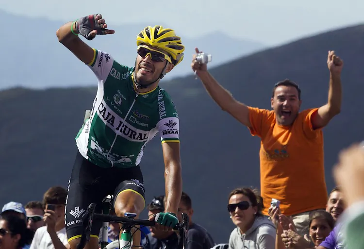 Spain's Antonio Piedra of Caja Rural celebrates as he crosses the finish line to win Stage 15 of the Vuelta a España. (Jaime Reina/AFP/GettyImages)