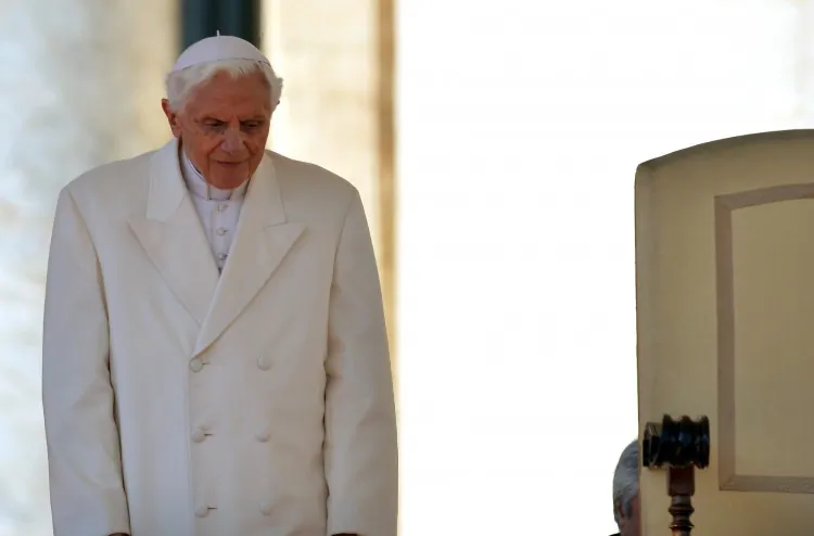Pope Benedict XVI (R) leaves the altar with secretary Georg Gaenswein at the end of his last weekly audience on Feb. 27, 2013, at St Peter's Square at the Vatican. (Alberto Pizzoli/AFP/Getty Images)