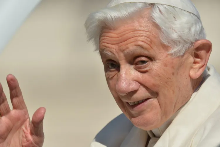 Pope Benedict XVI (R) leaves the altar with secretary Georg Gaenswein at the end of his last weekly audience on Feb. 27, 2013, at St Peter's Square at the Vatican. (Alberto Pizzoli/AFP/Getty Images)