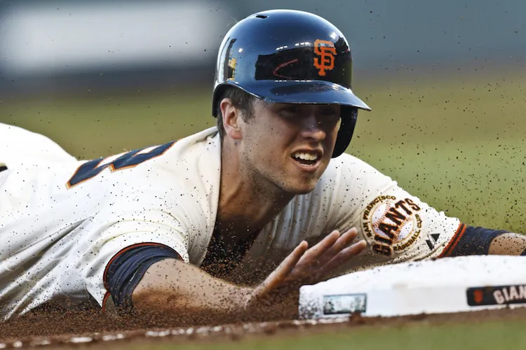 San Francisco catcher Buster Posey has his team headed for the postseason again. (Jason O. Watson/Getty Images)