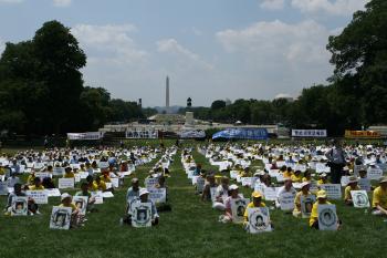 Over 1,000 practitioners from many parts of the world protest July 16 at a rally in front of the Capitol in Washington, D.C. (Lisa Fan/Epoch Times) Over 1,000 practitioners from many parts of the world protest July 16 at a rally in front of the Capitol in Washington, D.C. (Lisa Fan/Epoch Times)