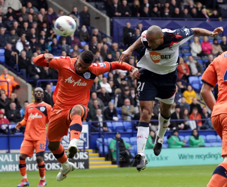 QPR manager Mark Hughes’s gestures tell it all in another tough loss. (Ross Kinnaird/Getty Images)