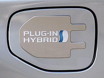 HYBRID POWER: A logo is displayed on a Toyota Prius plug-in hybrid in San Francisco. Toyota Motor Corp. is planning to expand its Prius lineup of hybrid vehicles. (Justin Sullivan/Getty Images)