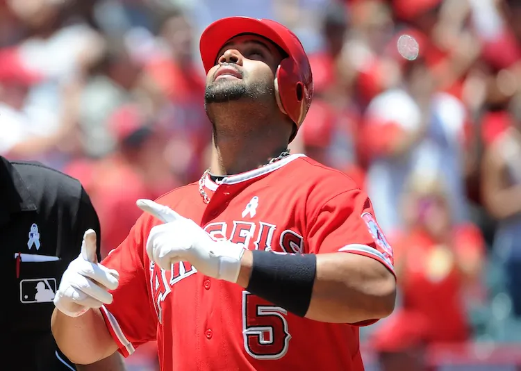 Albert Pujols, who had a very slow start, has eight multi-hit games this month and has the Angels headed in the right direction. (Lisa Blumenfeld/Getty Images)