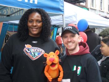 GIVING TO THE CITY: Kym Hampton, unnamed feline and Tim Young. (Denise Benson/The Epoch Times)