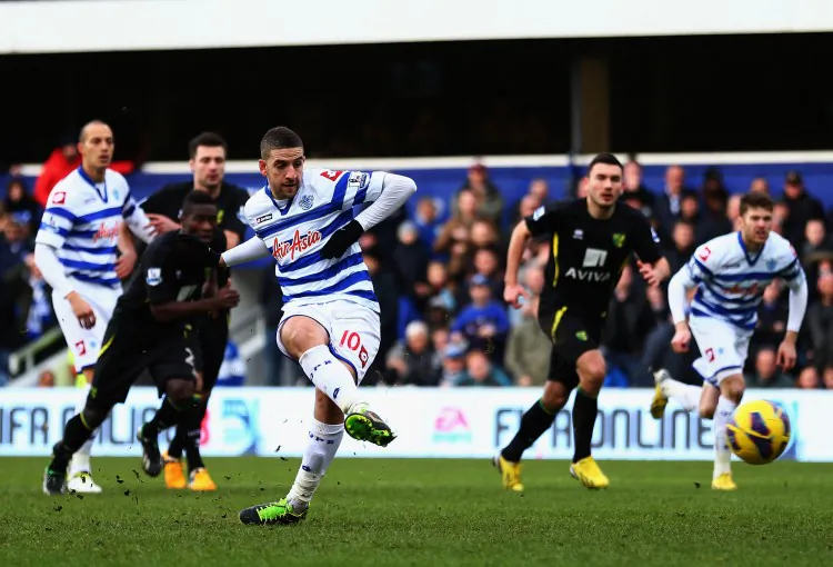 QPR’s Adel Taarabt takes a penalty kick in the second half against Norwich City in English Premier League action in London on Feb. 2, 2013. (Paul Gilham/Getty Images)