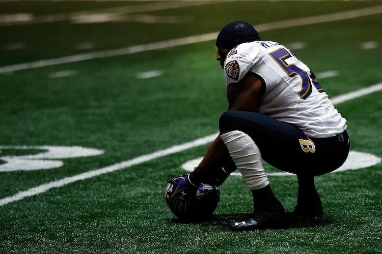 Ray Lewis and the Ravens watched their momentum slip away during the 34-minute power outage, only to make a last-second defensive stand to wrap up the Super Bowl. (Chris Graythen/Getty Images)