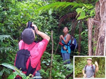 Ravan the orchid hunter and his partner Josephine in the Puerto Galera rainforest. Oriental Mindoro, Philippines. (Michael Wolf/The Epoch Times) Ravan the orchid hunter and his partner Josephine in the Puerto Galera rainforest. Oriental Mindoro, Philippines. (Michael Wolf/The Epoch Times)