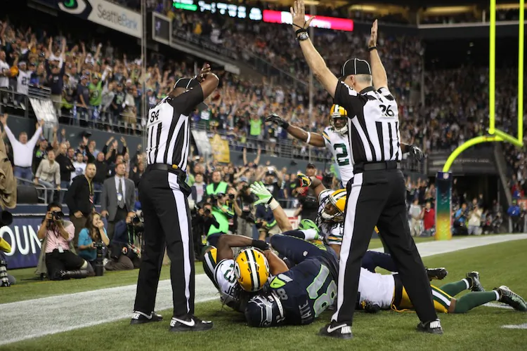 The NFL's replacement referees have taken some heat this season, especially at the ending of Monday night's game. (Otto Greule Jr/Getty Images)