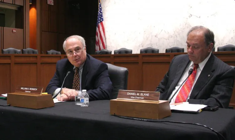 On Nov. 16 on Capitol Hill, William Reinsch (L), chairman of the U.S.-China Economic and Security Review Commission (USCC), and Daniel Slane, vice chairman, released the 2011 USCC annual report to Congress. Reinsch served as undersecretary for Export Administration in the U.S. Department of Commerce. Slane has extensive international business experience, including operating a business in China. (Gary Feuerberg/The Epoch Times)